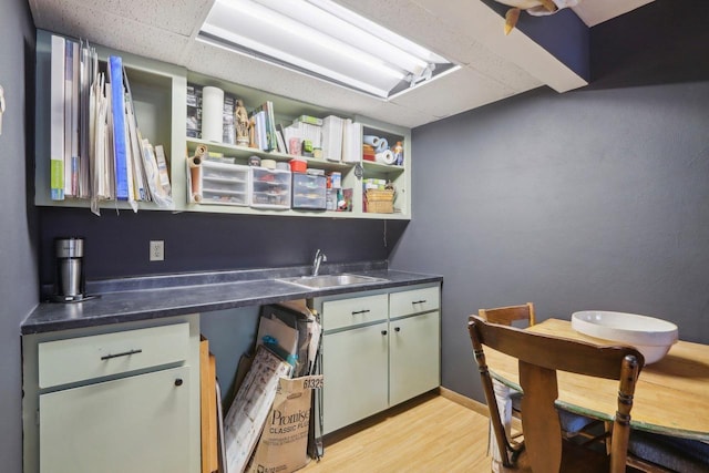 kitchen with light wood-type flooring and sink