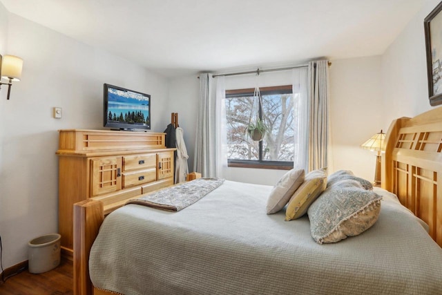 bedroom featuring hardwood / wood-style floors