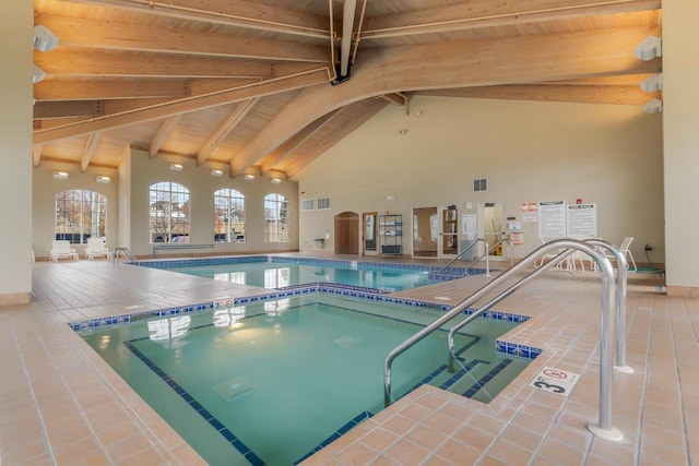 view of pool with an indoor in ground hot tub