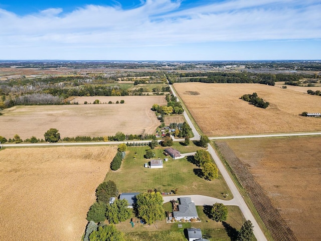 birds eye view of property featuring a rural view