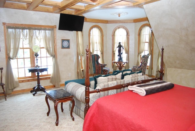 bedroom featuring carpet flooring, beam ceiling, and coffered ceiling