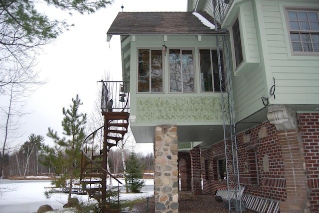 view of snow covered property