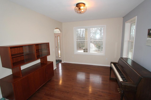 miscellaneous room with dark hardwood / wood-style flooring