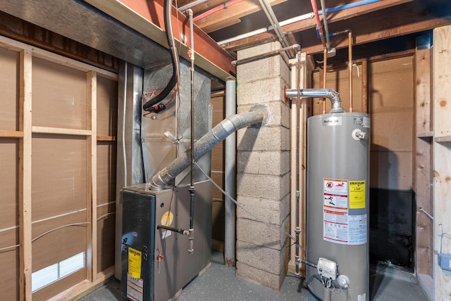 utility room with gas water heater