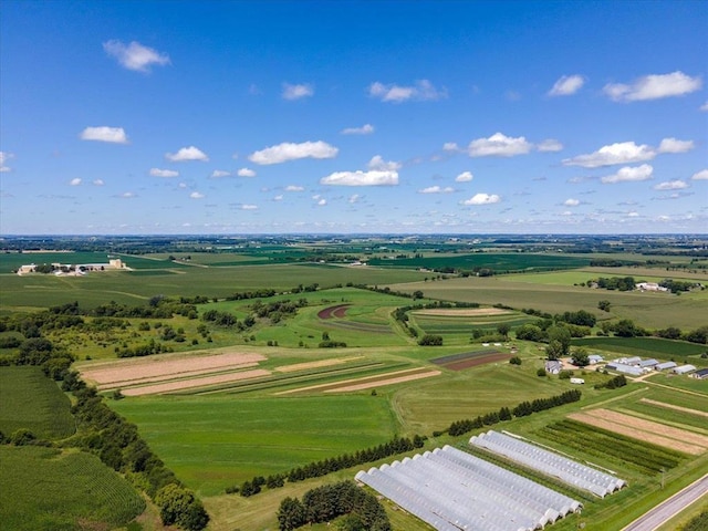 birds eye view of property featuring a rural view