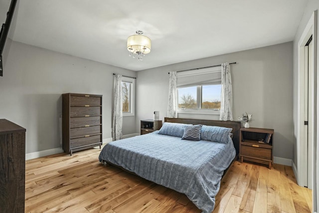 bedroom with light wood-type flooring