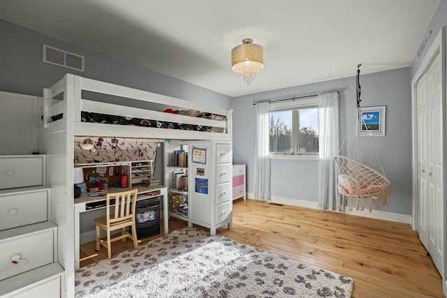 bedroom featuring hardwood / wood-style flooring