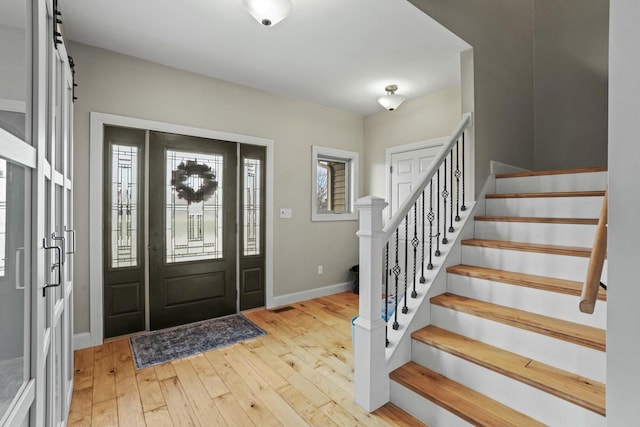 foyer entrance featuring light hardwood / wood-style flooring