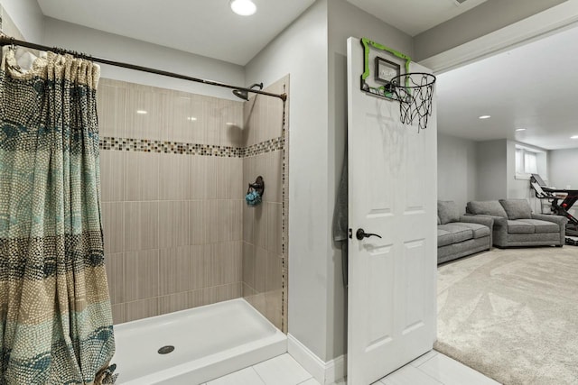 bathroom featuring tile patterned flooring and a shower with shower curtain