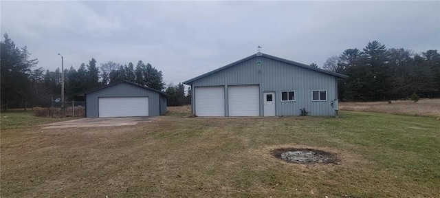 garage with a lawn