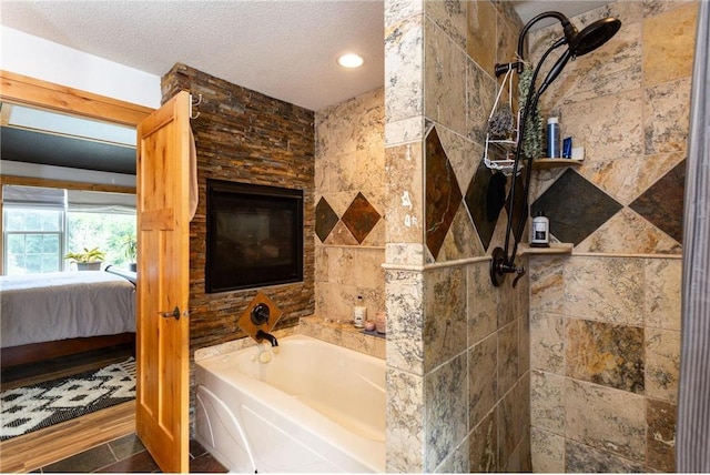 bathroom featuring wood-type flooring, a textured ceiling, and plus walk in shower