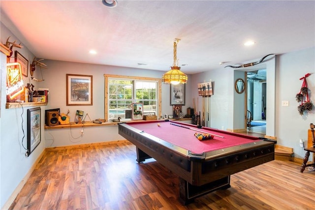 game room featuring hardwood / wood-style floors and billiards