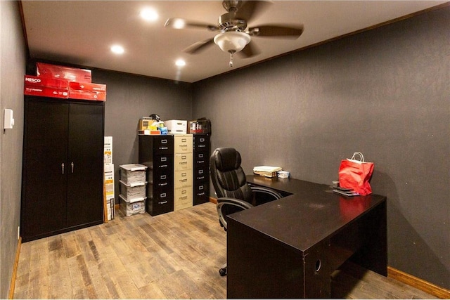 office area with ceiling fan and light hardwood / wood-style floors