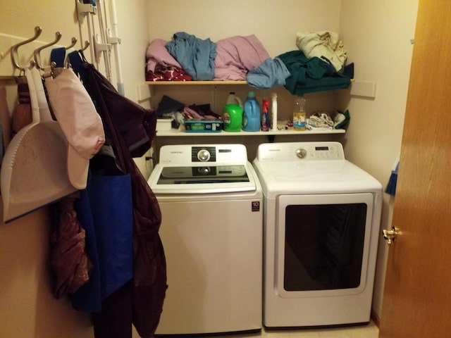 laundry area with washer and clothes dryer