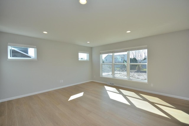 929 5 Mile Rd, Racine, WI 53402 - spare room featuring light wood finished floors and recessed lighting