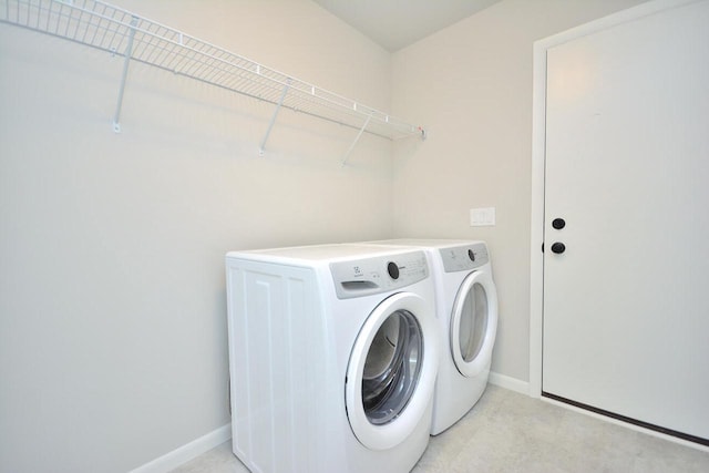 929 5 Mile Rd, Racine, WI 53402 - washroom featuring separate washer and dryer and baseboards
