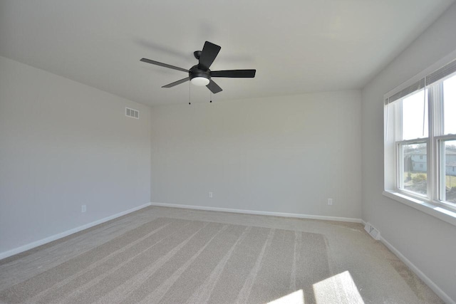 929 5 Mile Rd, Racine, WI 53402 - unfurnished room with light carpet and a ceiling fan
