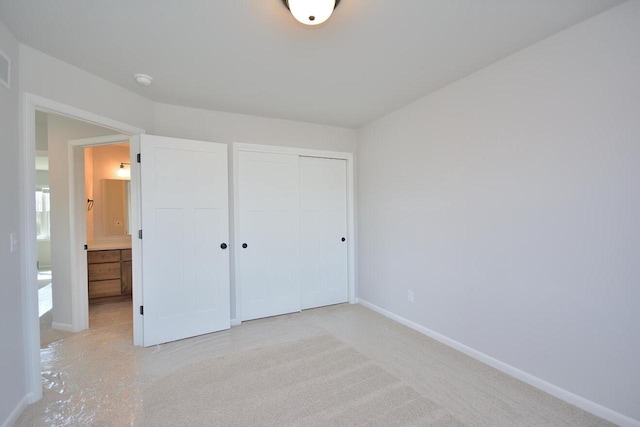 929 5 Mile Rd, Racine, WI 53402 - unfurnished bedroom with baseboards and a closet