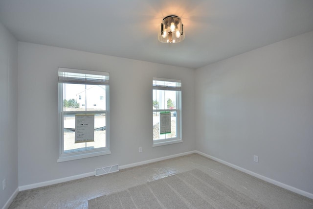 929 5 Mile Rd, Racine, WI 53402 - spare room with light colored carpet