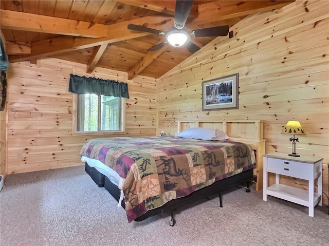 carpeted bedroom with vaulted ceiling with beams, ceiling fan, wood ceiling, and wooden walls