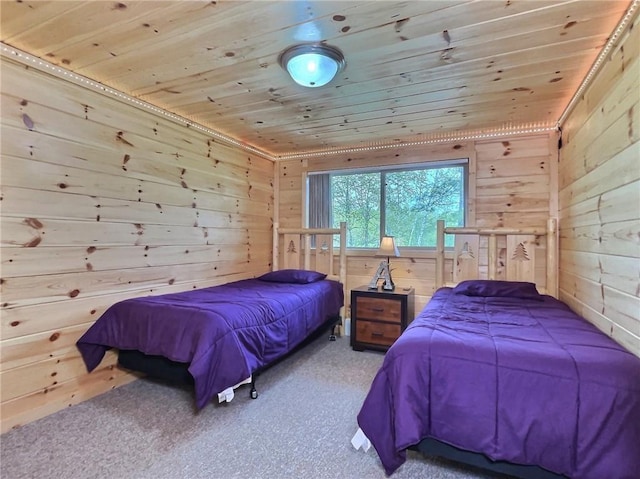 bedroom with carpet floors, wooden ceiling, and wooden walls