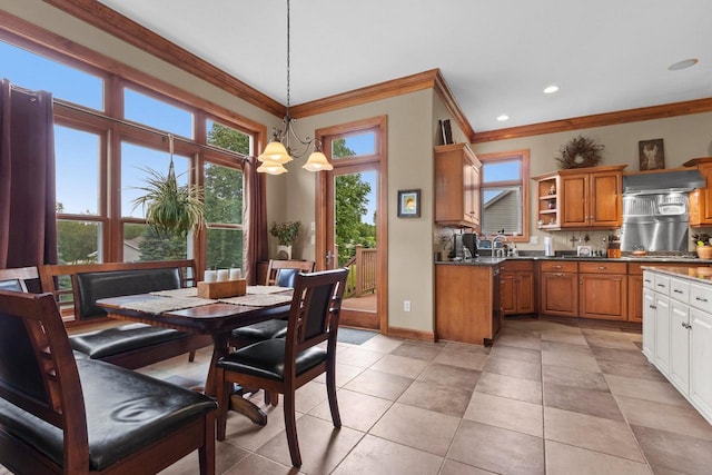 217 Hidden Ridges Way, Combined Locks, WI 54113 - dining space featuring crown molding, a chandelier, light tile patterned floors, baseboards, and recessed lighting