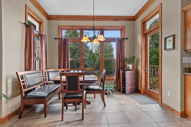 tiled dining space with a notable chandelier and crown molding