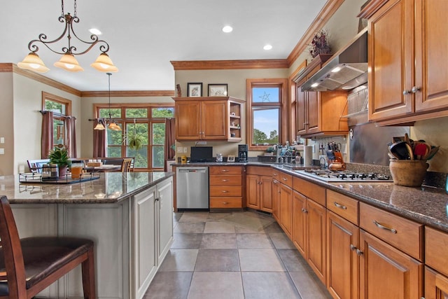 217 Hidden Ridges Way, Combined Locks, WI 54113 - kitchen with stainless steel appliances, crown molding, wall chimney exhaust hood, open shelves, and brown cabinets
