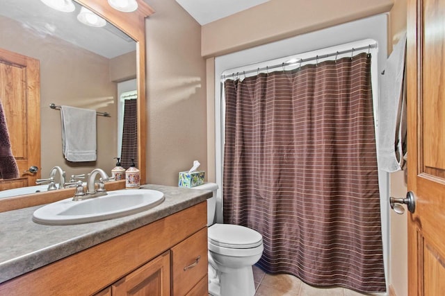 217 Hidden Ridges Way, Combined Locks, WI 54113 - bathroom with vanity, toilet, tile patterned flooring, and curtained shower