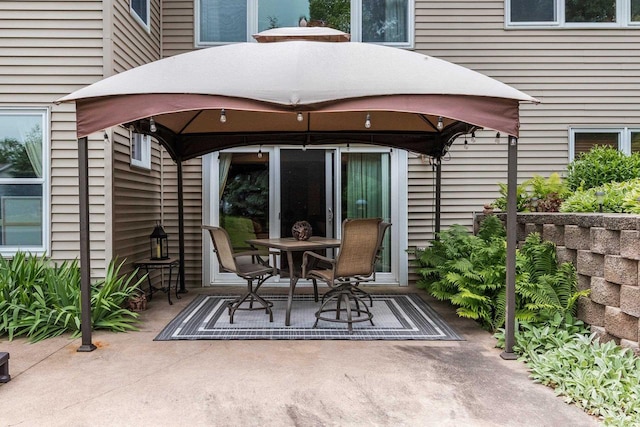 217 Hidden Ridges Way, Combined Locks, WI 54113 - view of patio / terrace featuring a gazebo and outdoor dining space