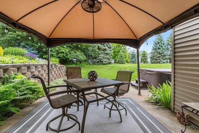 217 Hidden Ridges Way, Combined Locks, WI 54113 - view of patio featuring a gazebo, a hot tub, and outdoor dining space