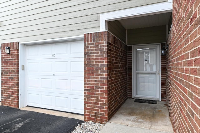 property entrance featuring a garage