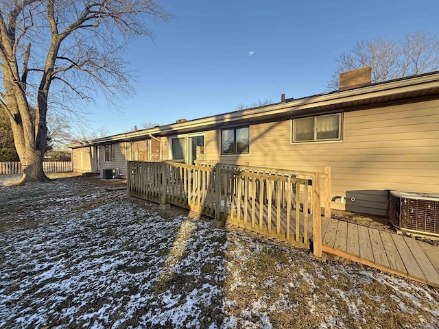 637 N Wright Rd, Janesville, WI 53546 - rear view of property featuring a wooden deck and a chimney