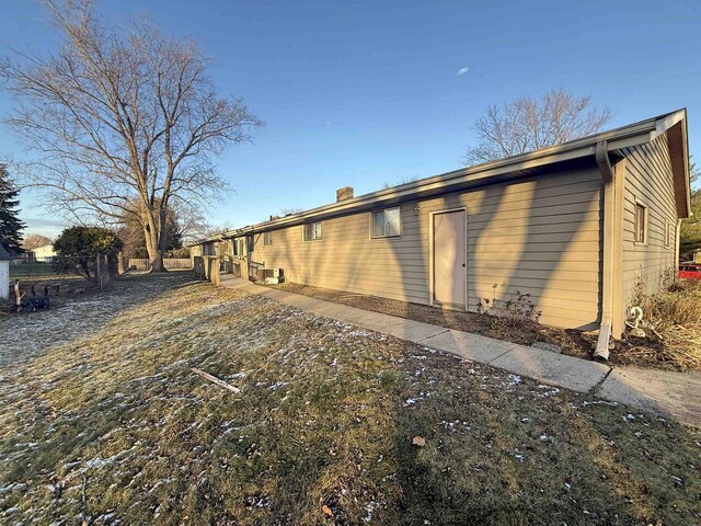 637 N Wright Rd, Janesville, WI 53546 - back of property with a chimney
