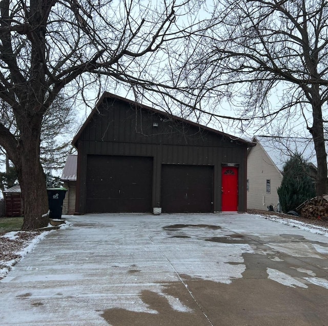 view of snow covered garage