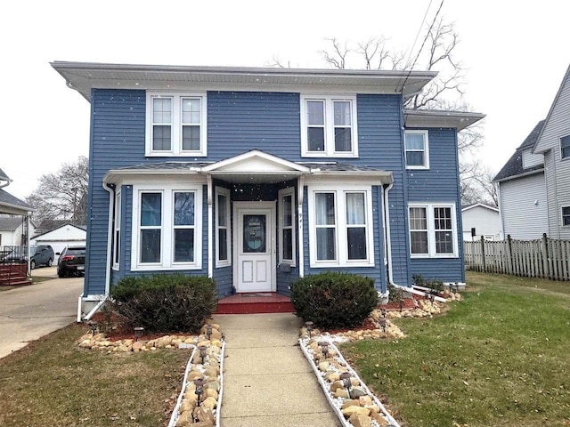 view of front property with a front lawn