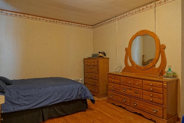 bedroom featuring light hardwood / wood-style flooring