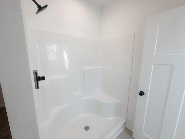 full bathroom with walk in shower