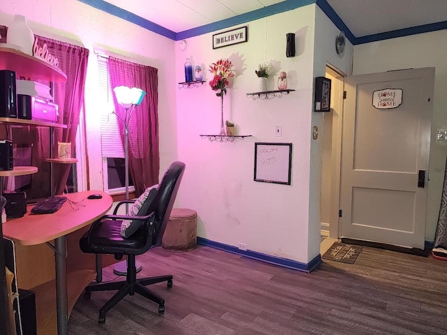 home office with hardwood / wood-style floors and crown molding