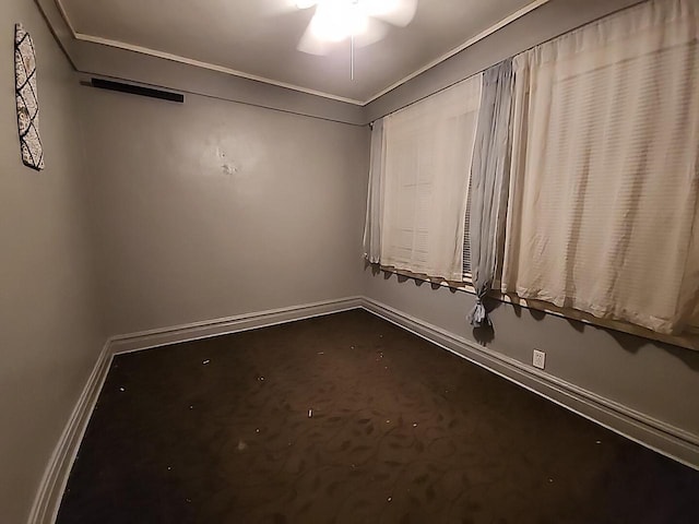 unfurnished room with ceiling fan