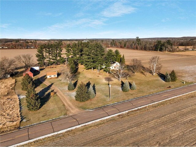 birds eye view of property featuring a rural view