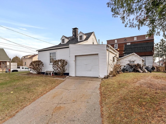 view of front facade featuring a garage and a front lawn