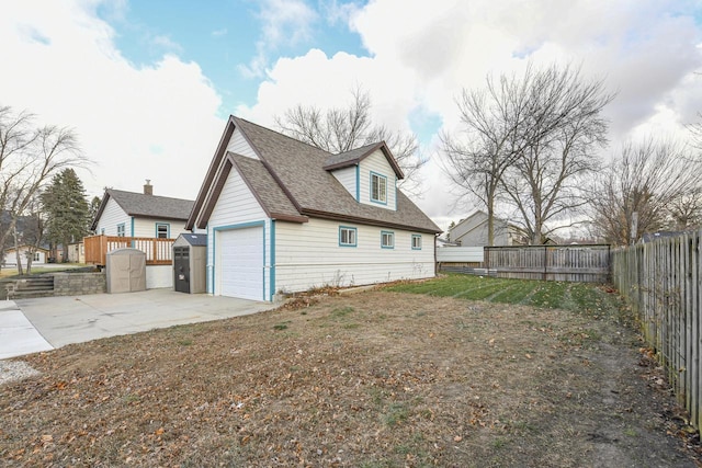 view of property exterior with a lawn and a patio