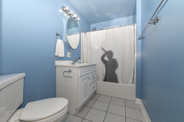 full bathroom featuring tile patterned flooring, vanity, toilet, and shower / bathtub combination with curtain