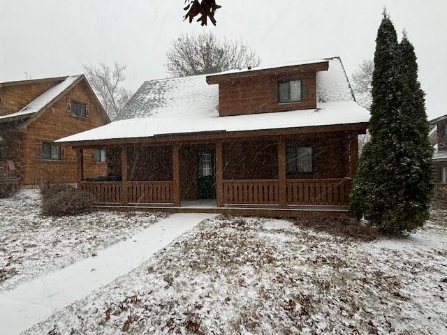 view of front of home featuring covered porch