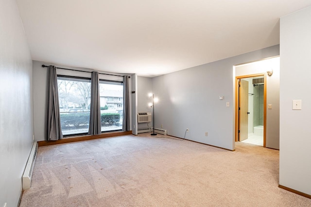 empty room with a wall mounted air conditioner, light colored carpet, and a baseboard heating unit