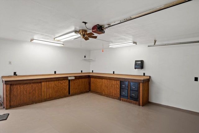 interior space featuring ceiling fan