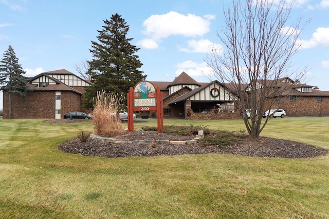 view of front of home with a front lawn