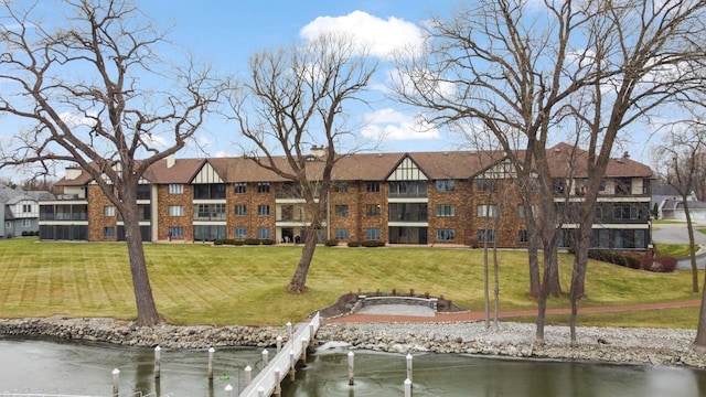 exterior space with a water view