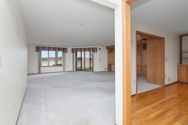 empty room with wood-type flooring